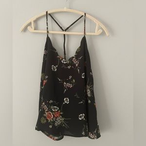 Item Details
100% Polyester
Sleeveless
V-neck
Floral Print